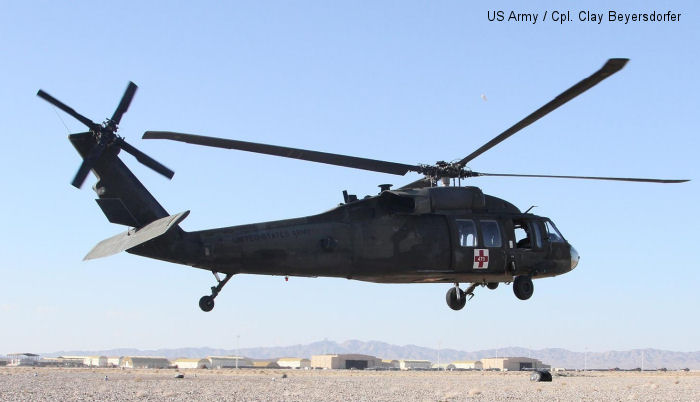 A UH-60 Black Hawk helicopter lifts off the airfield at Shindand Air Base, Afghanistan, Dec. 7, 2013. This particular Black Hawk is one of eight that provide medical evacuations. The 1st Bn., 168th Av. Regt., is responsible throughout the Regional Command (West) area of operations.