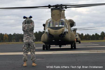 Chinooks from Alabama and Georgia National Guard refuel at North Carolina National Guard Flight Facility One before deploying in support of Hurricane Sandy