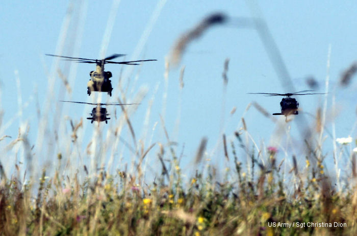 173rd Airborne Brigade paratroopers air assault through mock village during Saber Junction 14