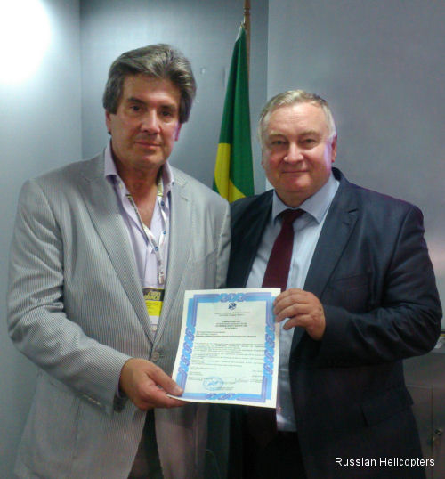 Sergei Ostapenko,<br> Russian Helicopters sales director for commercial helicopters (on the right), and Helipark’s President João Velloso.