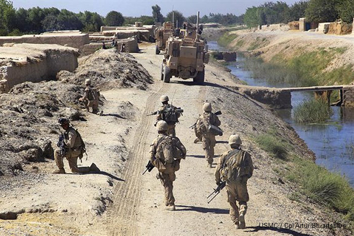 Bravo Company, 1st Battalion, 5th Marine Regiment conducts security patrol in Nawa district, Helmand province,  Aug. 7, 2009