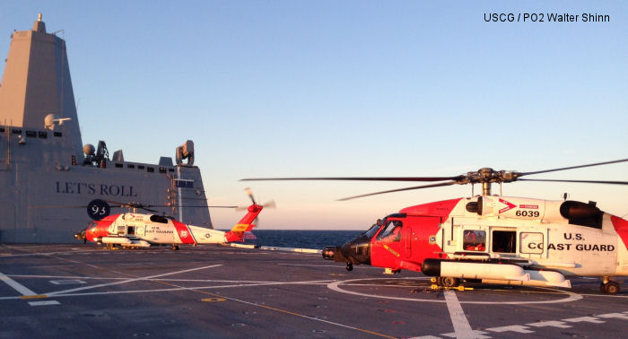 Coast Guard helicopters train aboard the Navy newest warship