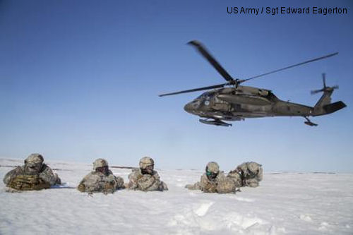 Paratroopers from the 6th Engineer Battalion (Combat Airborne), 2nd Engineer Brigade, U.S. Army, pull security after exiting a UH-60 Black Hawk helicopter from 1-207th Aviation Regiment, Alaska Army National Guard, during exercise Arctic Pegasus near Deadhorse, Alaska, May 1, 2014. Arctic Pegasus is a multi-component, joint exercise that will further refine planning and mission capabilities between U.S. Army Alaska, the U.S. Air Force, the Alaska National Guard, and the state of Alaska.