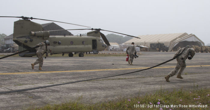 Under Operation United Assistance in Liberia the US Army 101st Sustainment Brigade, Task Force Lifeliners, train in remote fueling mission with Chinook helicopter from 2-501st AVN