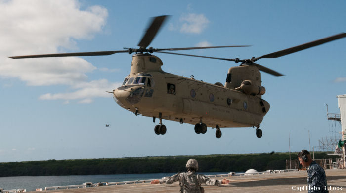 Two CH-47 Chinook helicopters from the 25th Combat Aviation Brigade practiced a Non-Combatant Evacuation in Hawaii picking up 60 refugees from Dillingham and evacuated them to ship at Pearl Harbor