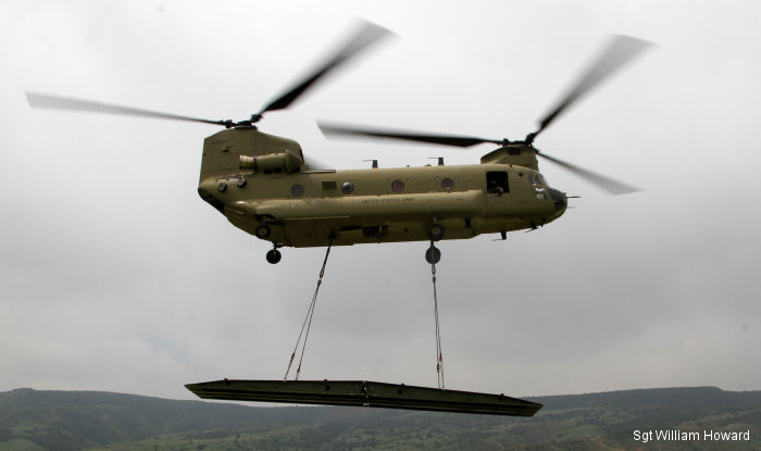 A CH-47F Chinook from 2nd General Support Aviation Battalion (GSAB), 4th Combat Aviation Brigade (CAB) sling load a Rapidly Emplaced Bridge System (REBS) to gap a crossing at Fort Carson
