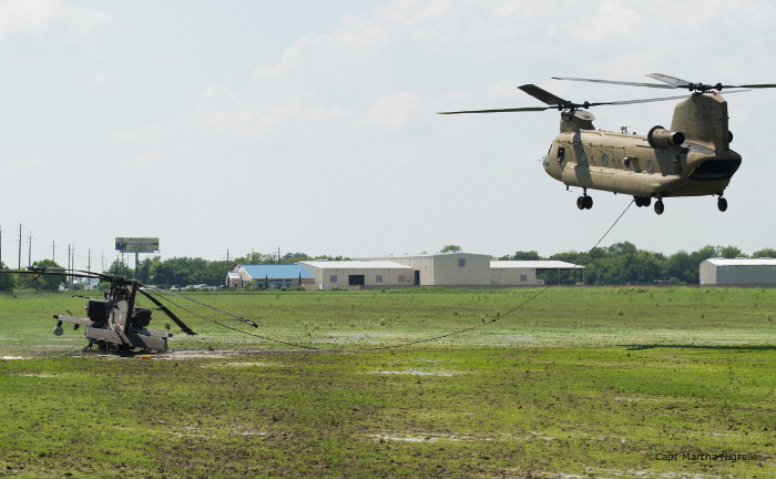 Texas Army National Guard, 1-149 ARB, 36th CAB AH-64D Apache was sling load by Chinook following a precautionary landing due to mechanical issues.