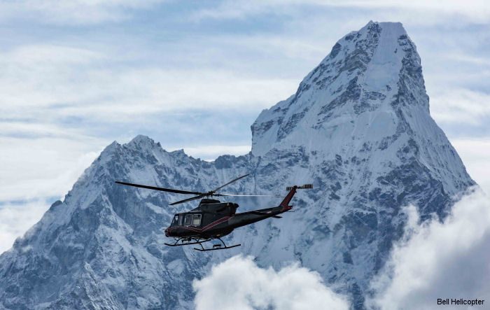 A Bell 412EPI, on a tour throughout Nepal, successfully demonstrated landing and take offs from 15200 f (4633 m) and flew up to 20000 f ( 6097 m) near Mount Everest with five passengers onboard