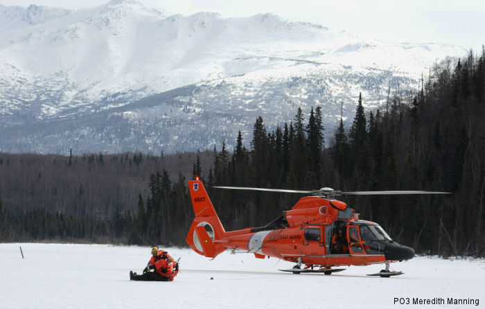 USCG Kodiak, Sector Anchorage and the National Ice Rescue School in Essexville, Michigan perform ice rescues from MH-60 Jayhawk and MH-65 Dolphin on Joint Base Elmendorf-Richardson, Alaska