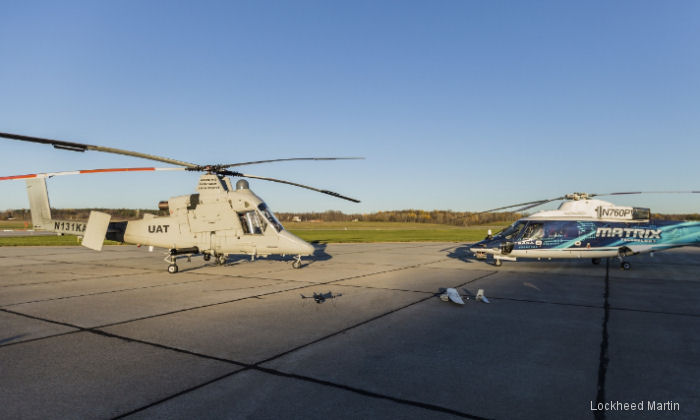 The unmanned K-MAX (left), optionally-piloted S-76 Sikorsky Autonomy Research Aircraft (SARA), Indago quadrotor (front left) and Desert Hawk 3.1 (front right)