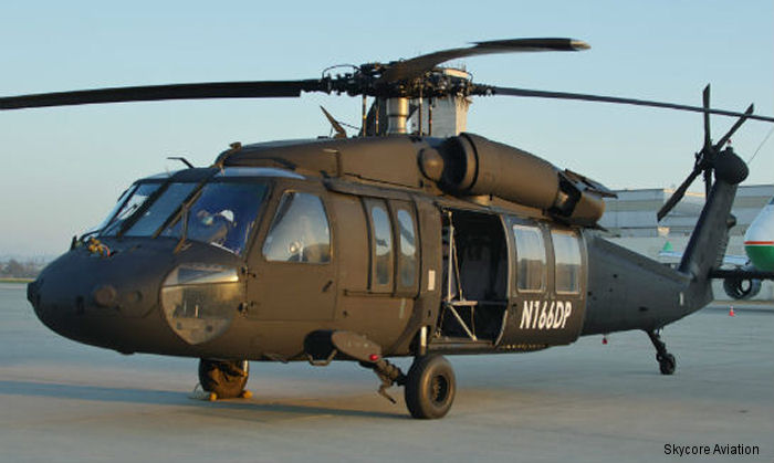 Helicopter Sikorsky UH-60A Black Hawk Serial 70-203 Register N166DP 80-23445 used by Skycore Aviation ,Unical Defense Inc ,US Army Aviation Army. Built 1980 Converted to Commercial UH-60. Aircraft history and location
