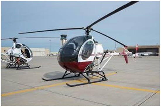 Helicopter Schweizer 300C Serial S1845 Register N2081G used by UND (University of North Dakota). Built 2003. Aircraft history and location