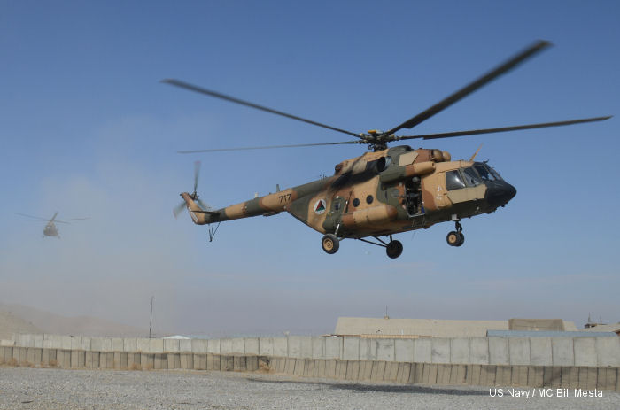 An Afghan National Security Forces transport helicopter prepares to land with several commandos of the 8th Special Operations Kandak, on board who participated in a combine training exercise with Afghan National Army aircrews in Pul-E-Alam district, Logar province, Jan. 30, 2014. The commandos conducted the training to expand the 8th SOK s capabilities and effectiveness when conducting independent operations to improve security in the area.