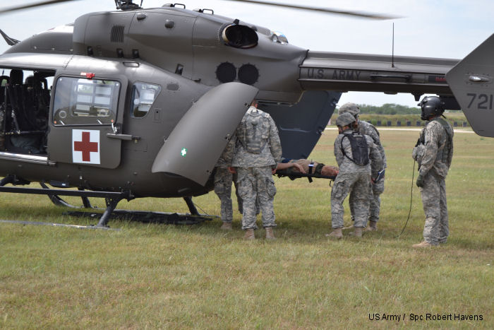 Members of 1077th Ground Ambulance Company, Kansas Army National Guard , Olathe KS, load a patient into a Lakota helicopter from D Company, 1st Battalion, 376th Aviation Regiment, Nebraska National Guard, Grand Island NB, as part of a large-scale, natural disaster exercise, Vigilant Guard 2014 hosted by the Kansas National Guard, at Crisis City, Salina, Kansas, Aug. 4-7, 2014