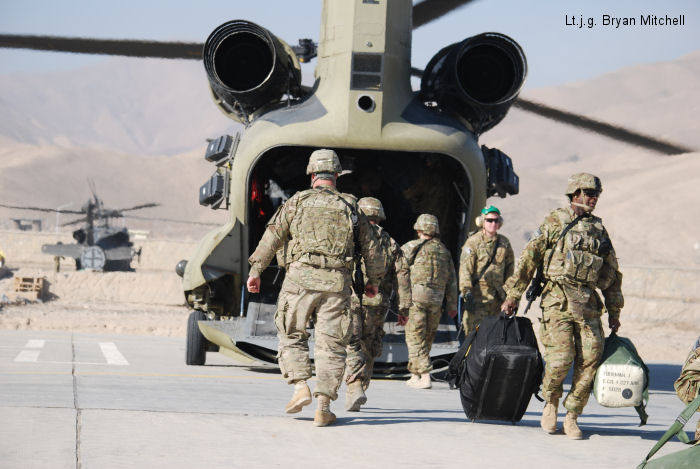 Troops from 1st Battalion, 41st Infantry Regiment arrive at Forward Operating Base Khilaguy via a Chinook helicopter flown by Task Force Reaper.