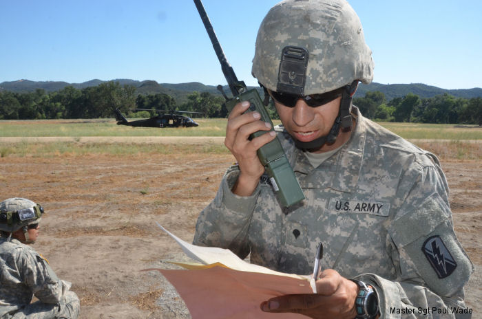 Cavalry field medics get trained on loading litter patients on medevac flight