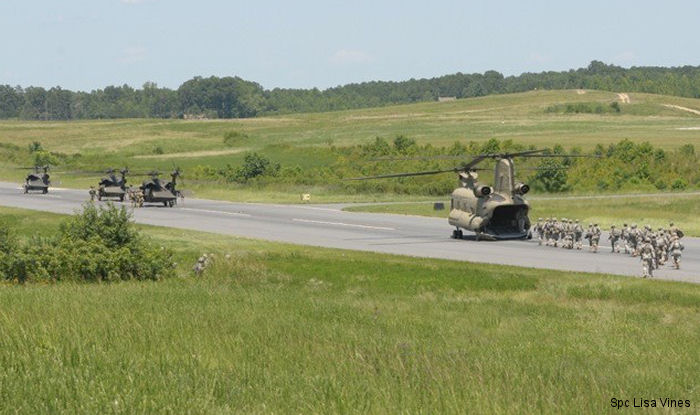 82nd Airborne Division soldiers load an Alabama Army National Guard CH-47F Chinook at Stanly County Airport in New London, NC 