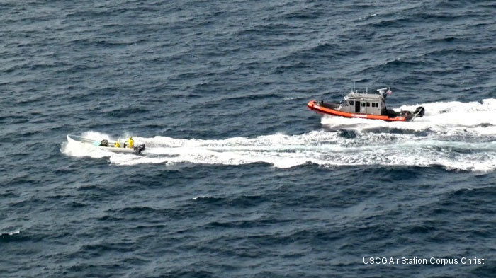 A Coast Guard Station South Padre Island boatcrew catches up to fleeing poachers aboard a Mexican lancha near the U.S.-Mexico maritime border Jan. 25, 2015. The poachers were apprehended and their catch was released.