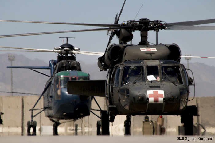 Black Hawk. Civilian contracted <a href=/database/model/1245/>S-61T Triton</a> on background
