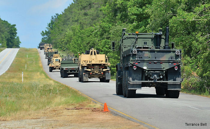 A convoy of driverless Army trucks makes its way through the Department of Energy s Savannah River Site in South Carolina, May 29, 2014.