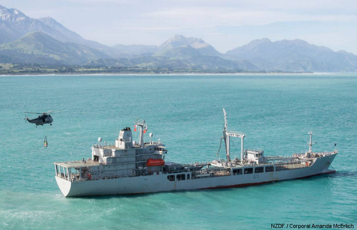 Canadian CH-124 Sea King  slings a load of supplies from HMNZS Endeavour near Kaikoura, New Zealand