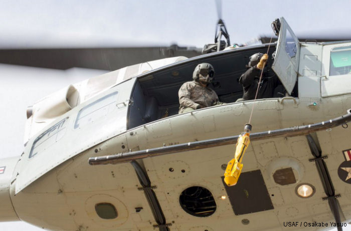 USAF 459th Airlift Squadron (459th AS) based at Yokota AFB, Japan,outfitted two of their UH-1N Hueys with new rescue hoists, improving their search and rescue capabilities