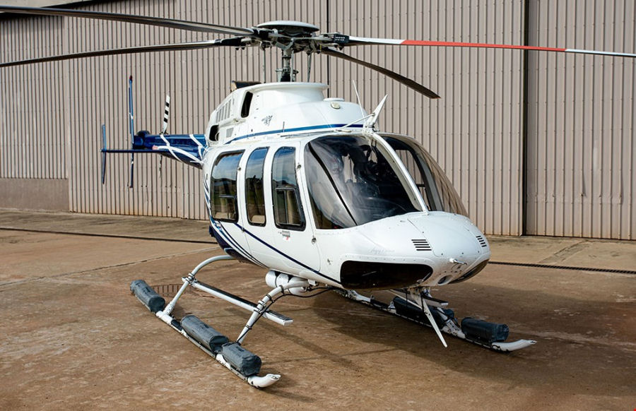 Helicopter Bell 407 Serial 53581 Register N28LL DQ-KOK VH-MND VH-ZHP used by Helicopters Inc. Built 2003. Aircraft history and location